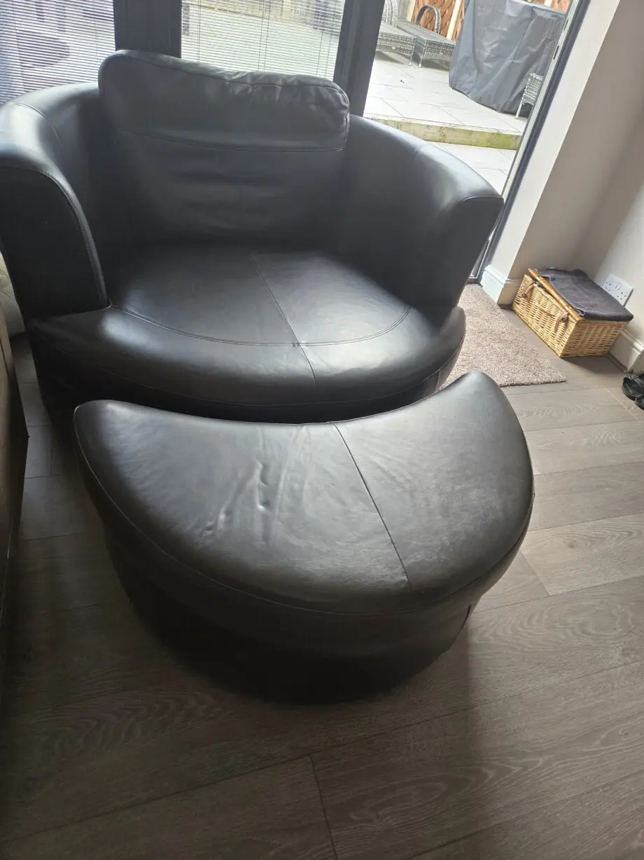 Fantatic DFS Freya 100% Black LeatherCuddle chair plus footstall