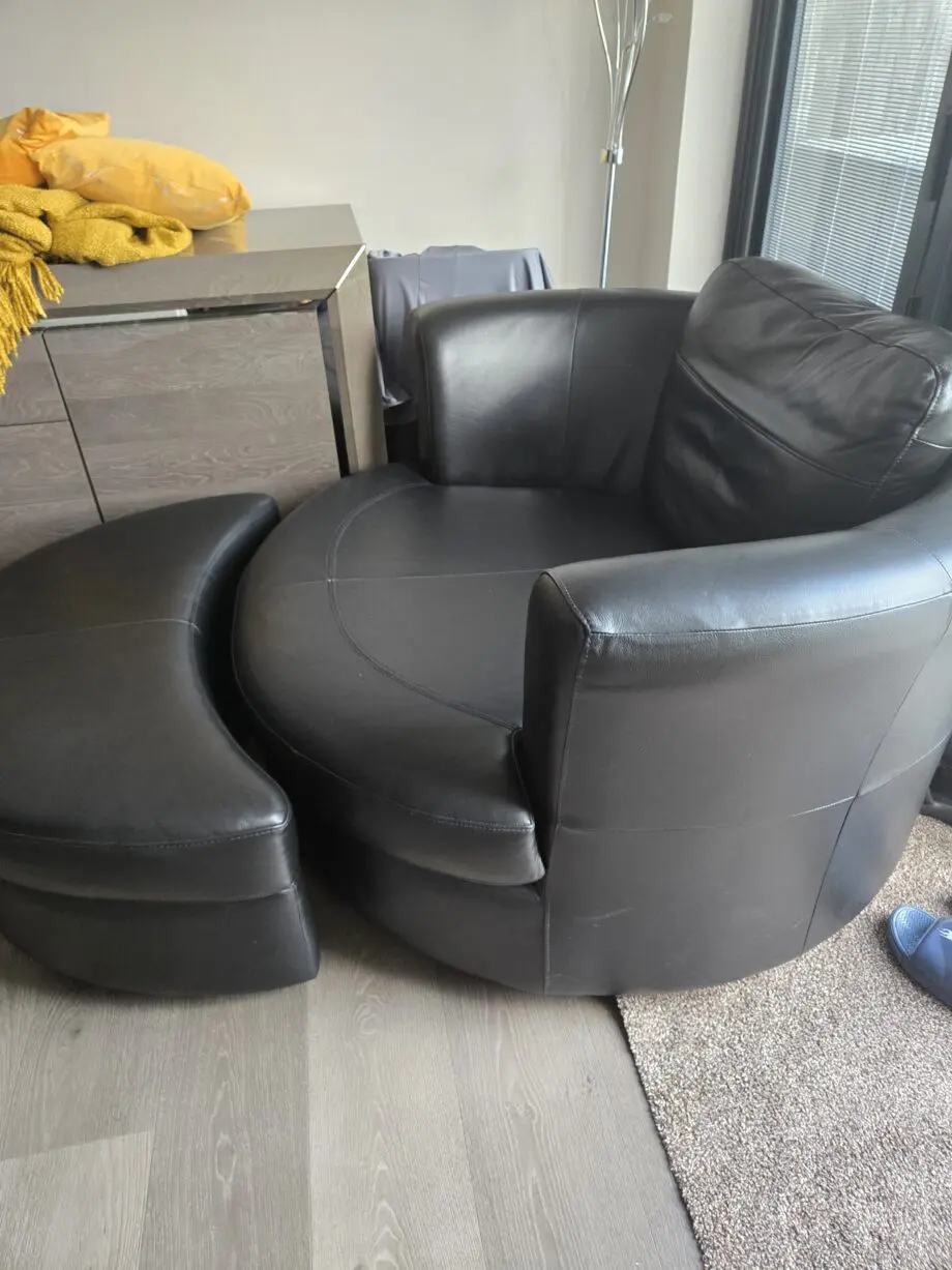Fantatic DFS Freya 100% Black LeatherCuddle chair plus footstall