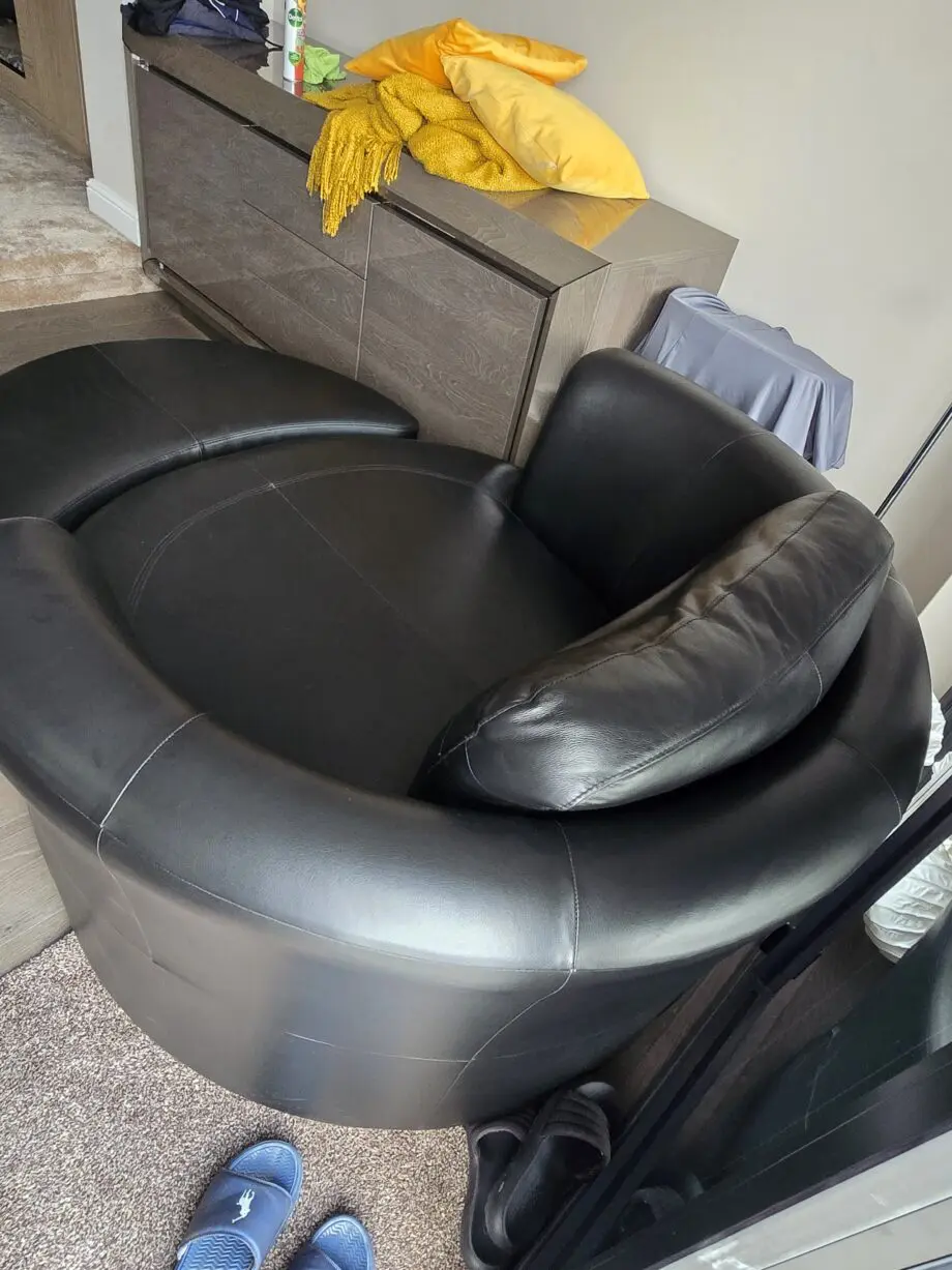 Fantatic DFS Freya 100% Black LeatherCuddle chair plus footstall