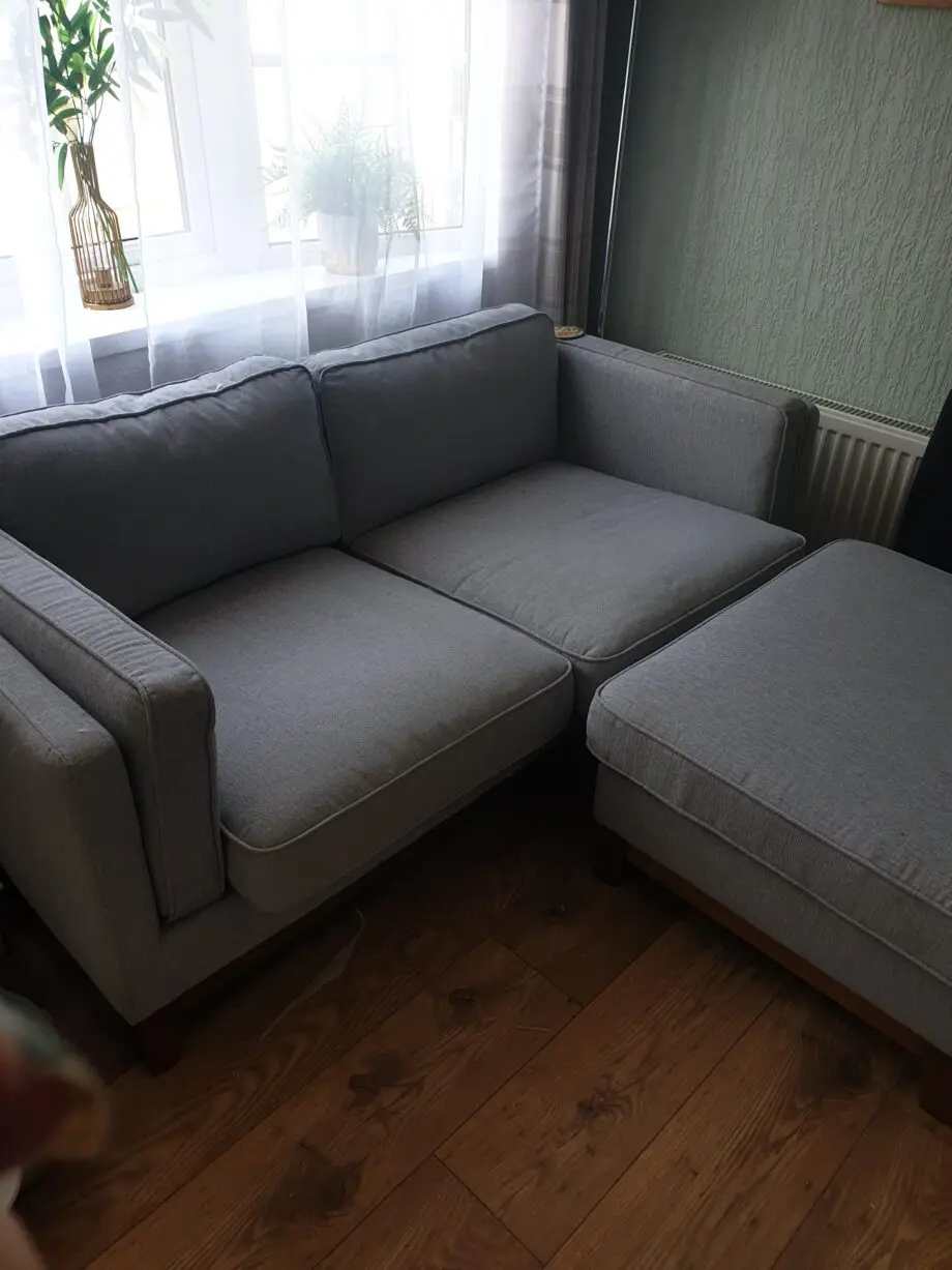 Sage green sofa from Daals Timber range