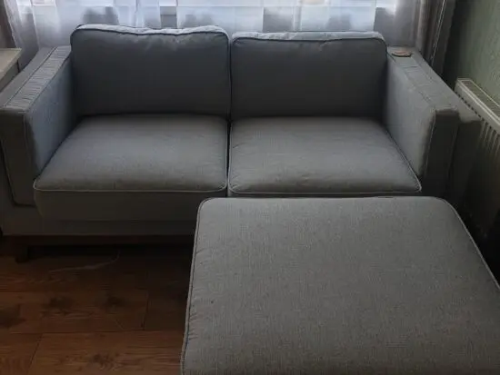 Sage green sofa from Daals Timber range