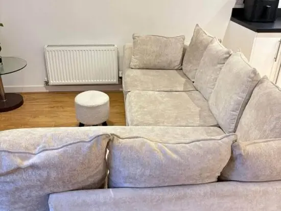 4 SEATER CREAM SOFA