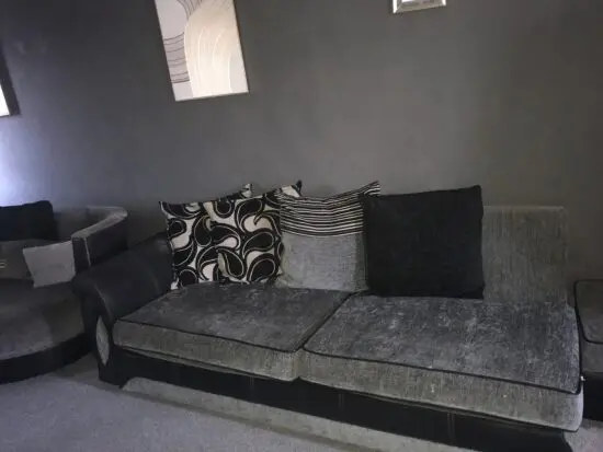 Black and grey corner sofa