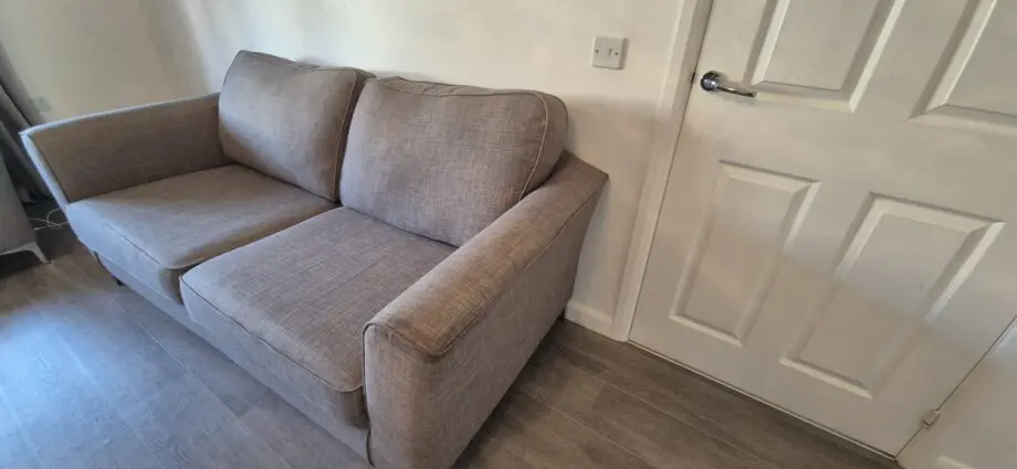 Grey fabic couch stainless steel legs