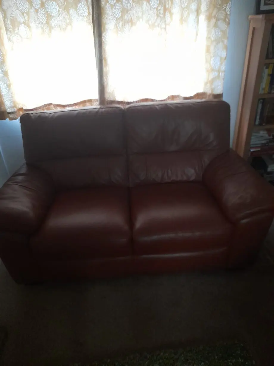 2 seater leather sofa with storage pouffe