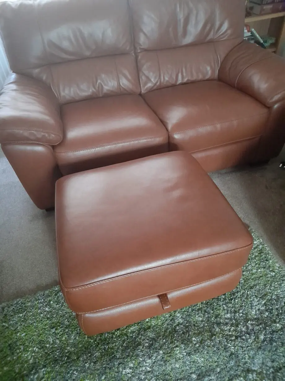 2 seater leather sofa with storage pouffe