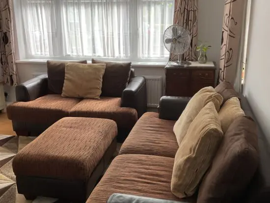 Harvey’s 3and2 Brown Leather and Fabric sofa set with ottoman.