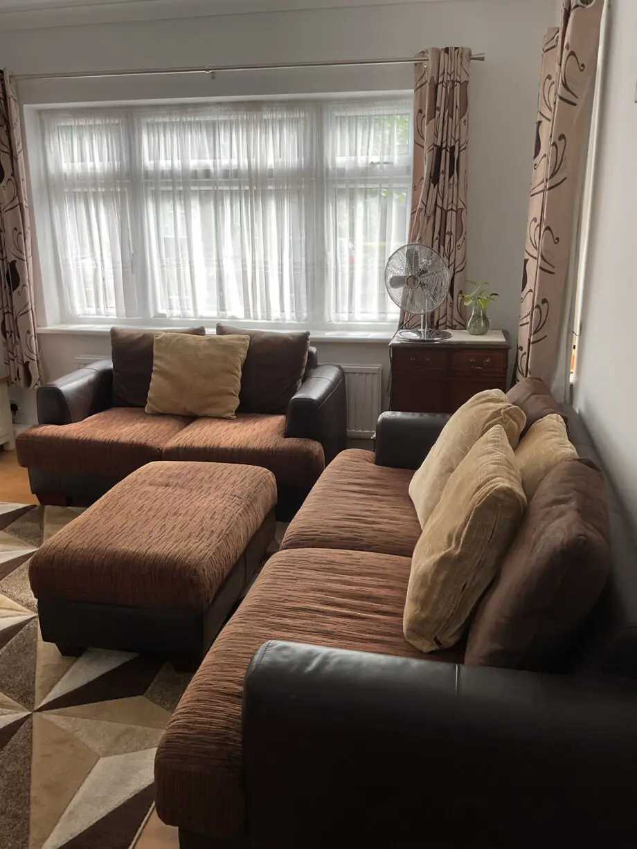 Harvey’s 3and2 Brown Leather and Fabric sofa set with ottoman.