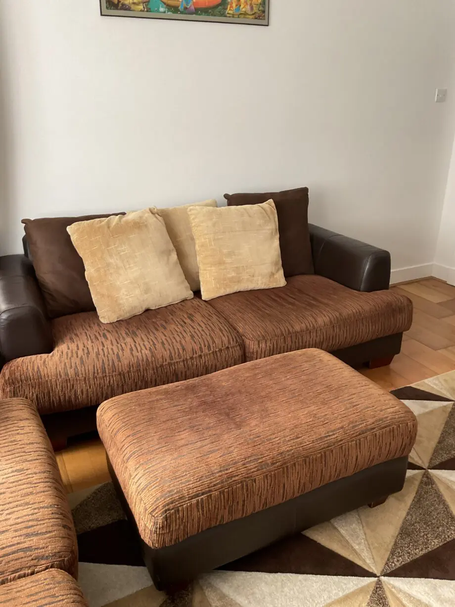Harvey’s 3and2 Brown Leather and Fabric sofa set with ottoman.