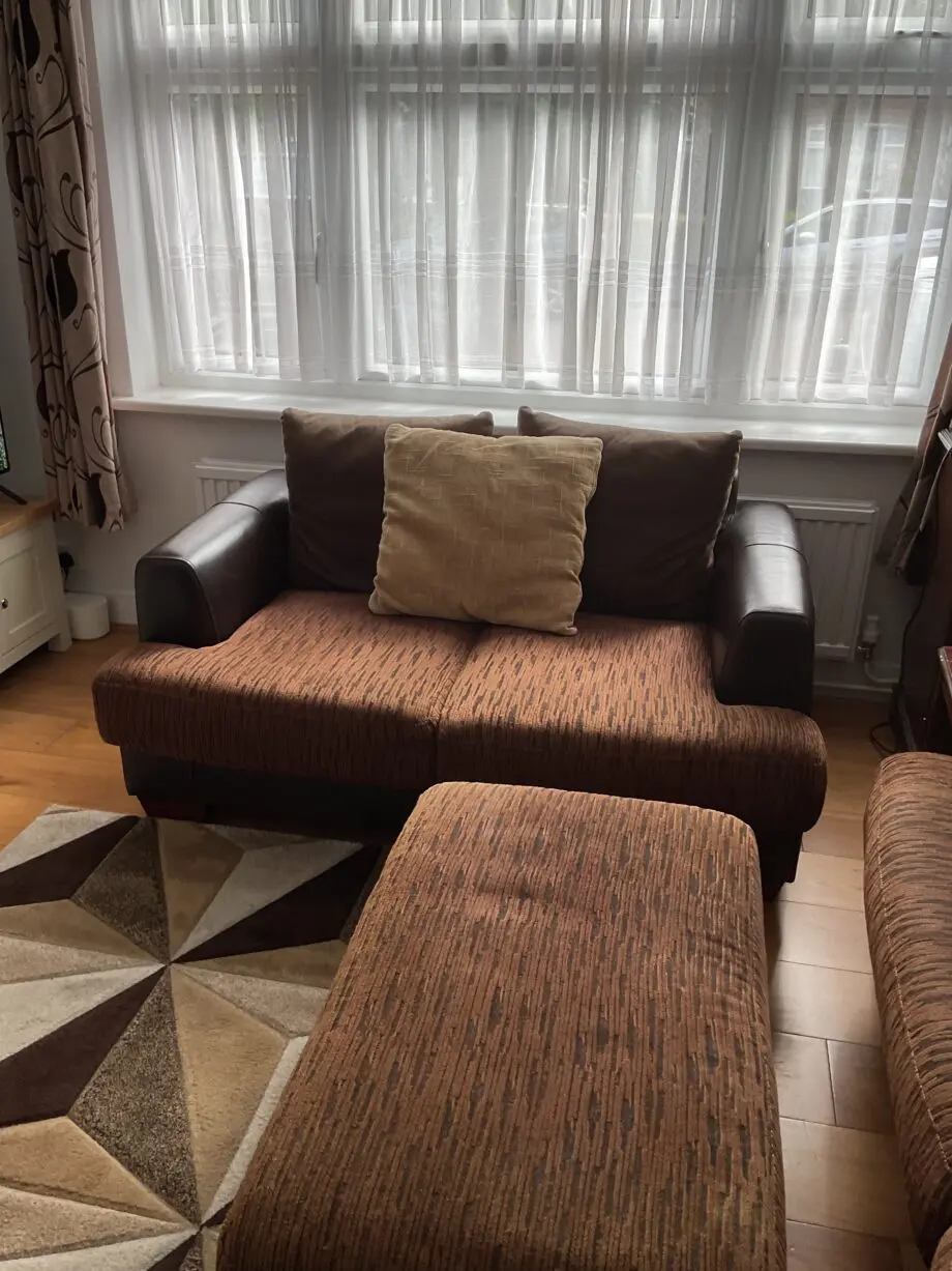 Harvey’s 3and2 Brown Leather and Fabric sofa set with ottoman.