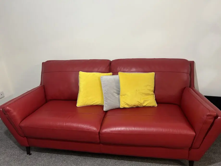 3 seat Leader red sofa , like new