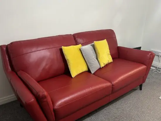 3 seat Leader red sofa , like new