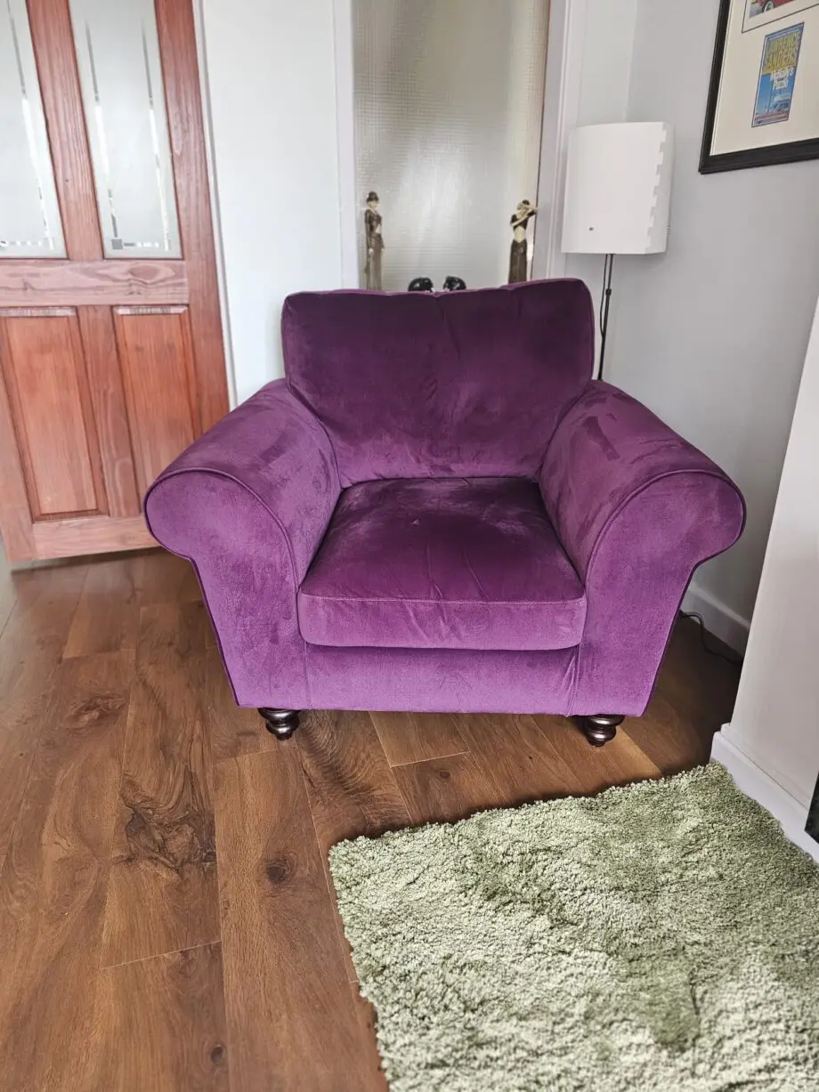 Purple velvet 3 seater sofa with 2 armchairs and a footstool