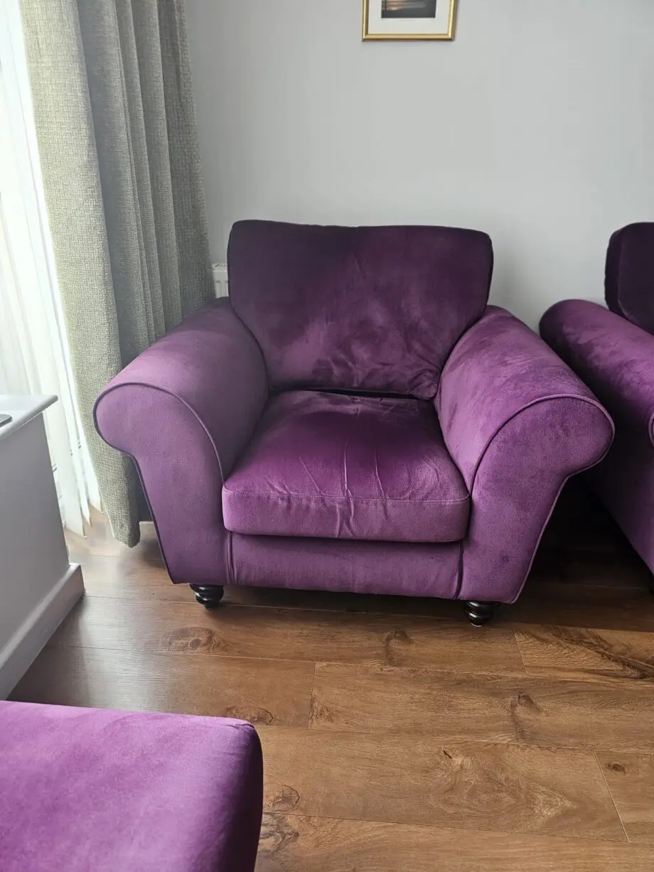 Purple velvet 3 seater sofa with 2 armchairs and a footstool
