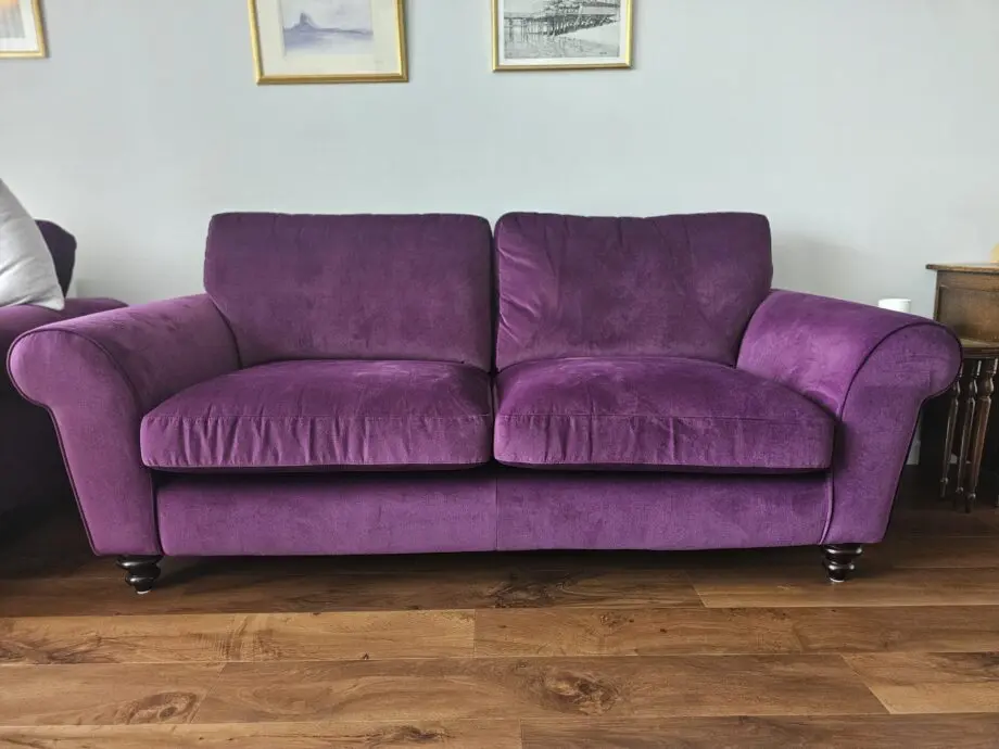 Purple velvet 3 seater sofa with 2 armchairs and a footstool