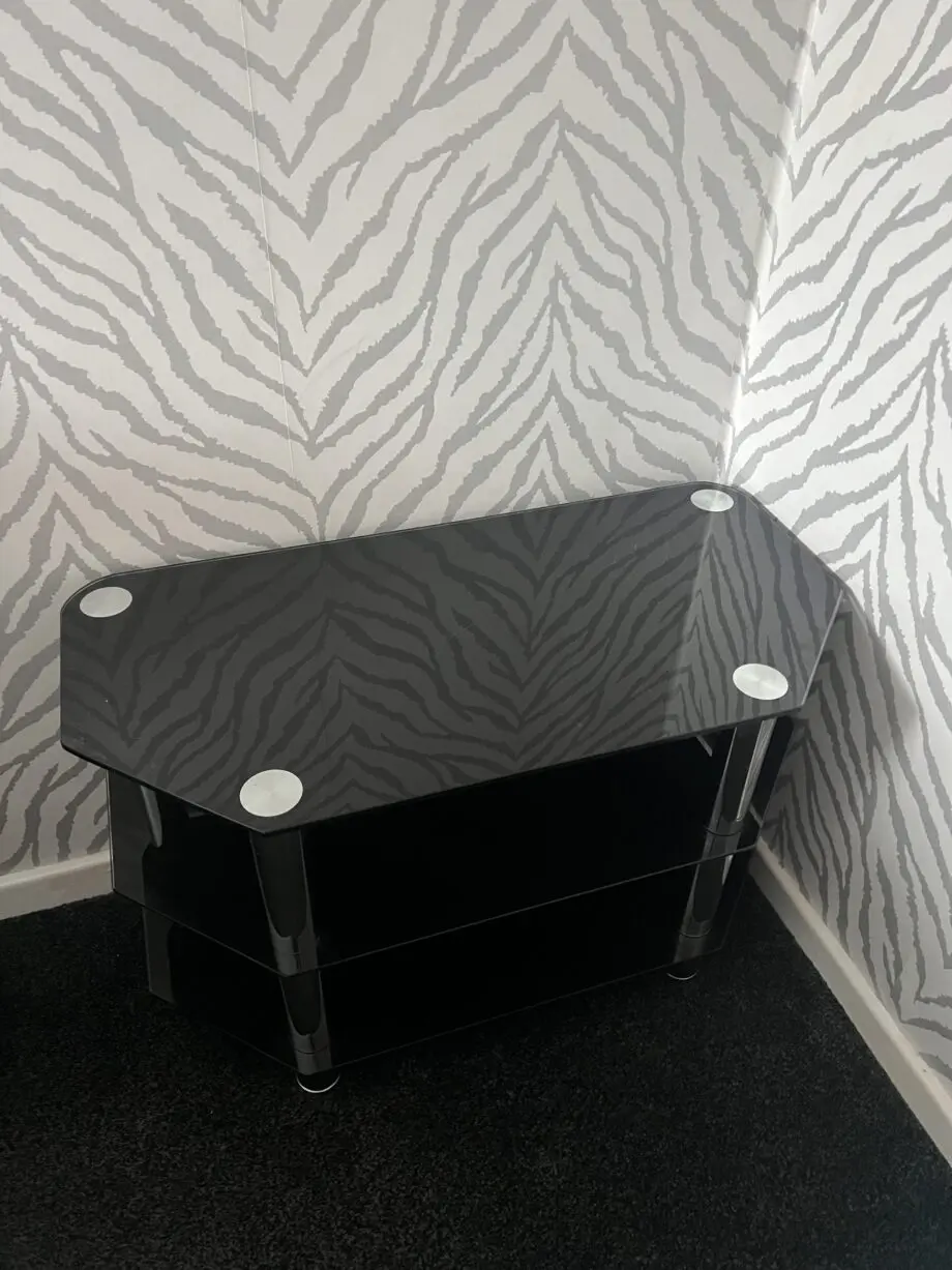 DFS black leather corner sofa & chair