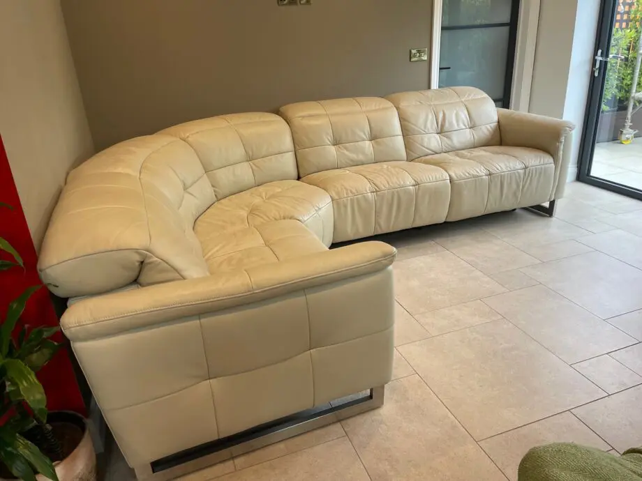 Stokers electric cream leather reclining corner sofa