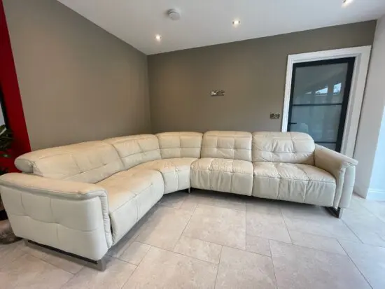 Stokers electric cream leather reclining corner sofa
