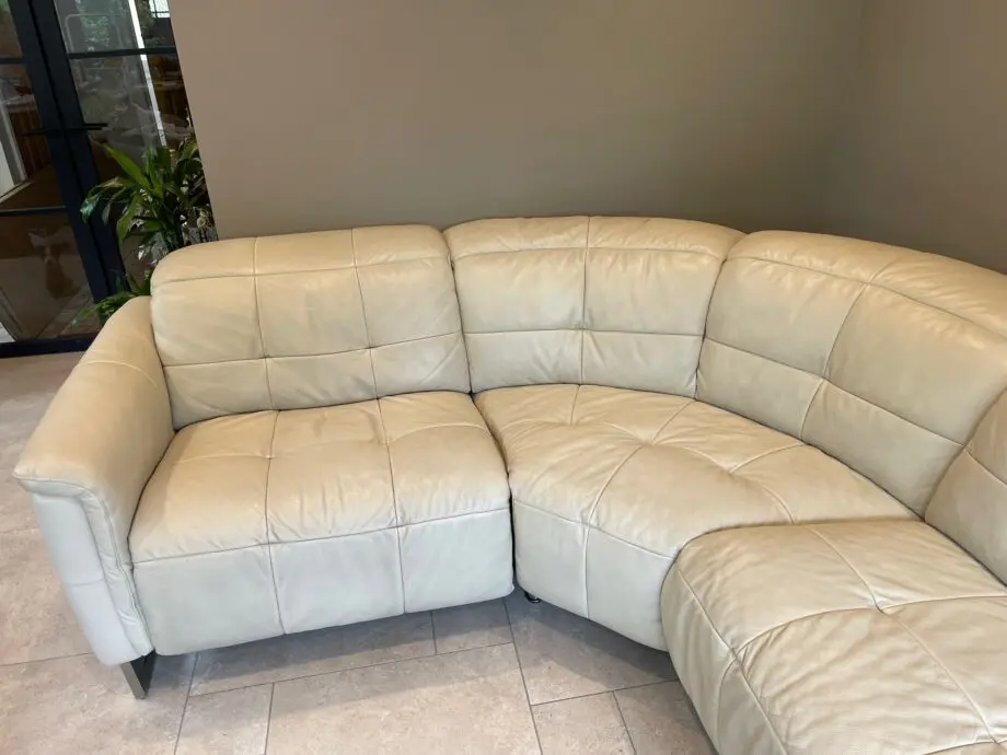 Stokers electric cream leather reclining corner sofa