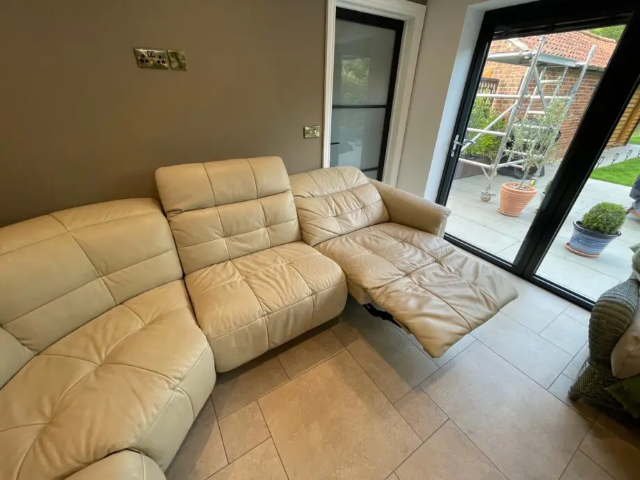 Stokers electric cream leather reclining corner sofa