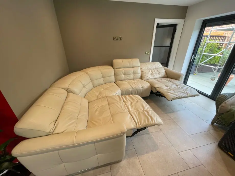 Stokers electric cream leather reclining corner sofa