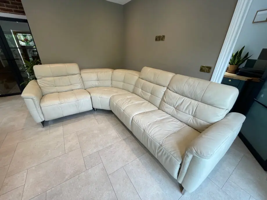 Stokers electric cream leather reclining corner sofa