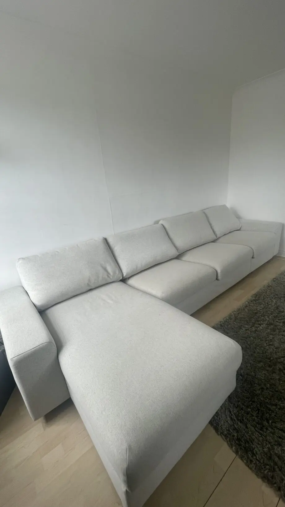Ikea, grey 4 seat sofa bed with chaise long storage.