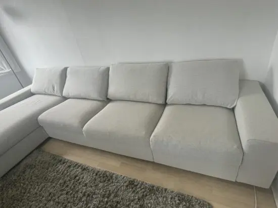 Ikea, grey 4 seat sofa bed with chaise long storage.