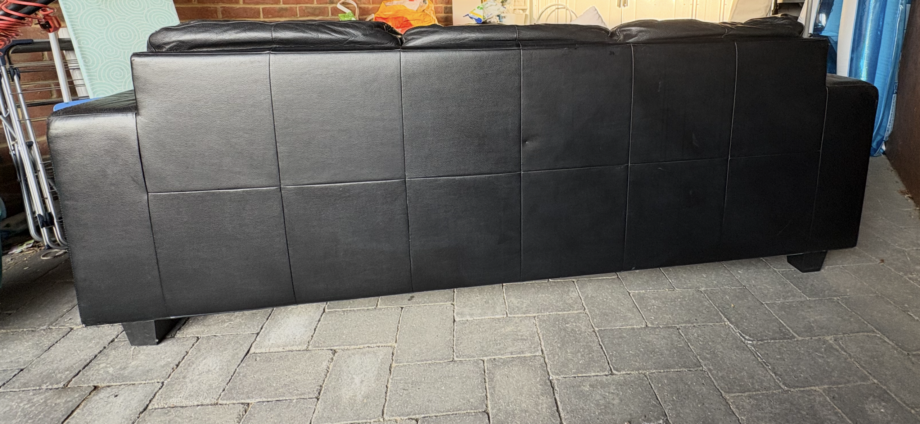 Ikea 3 seater black leather sofa