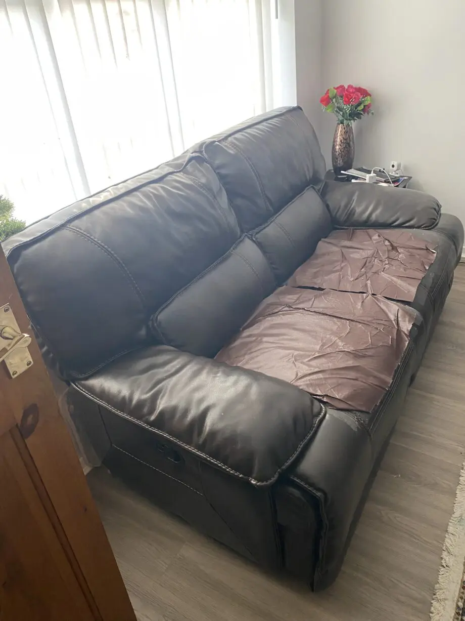 Brown 2 seater recliner (manual) sofa