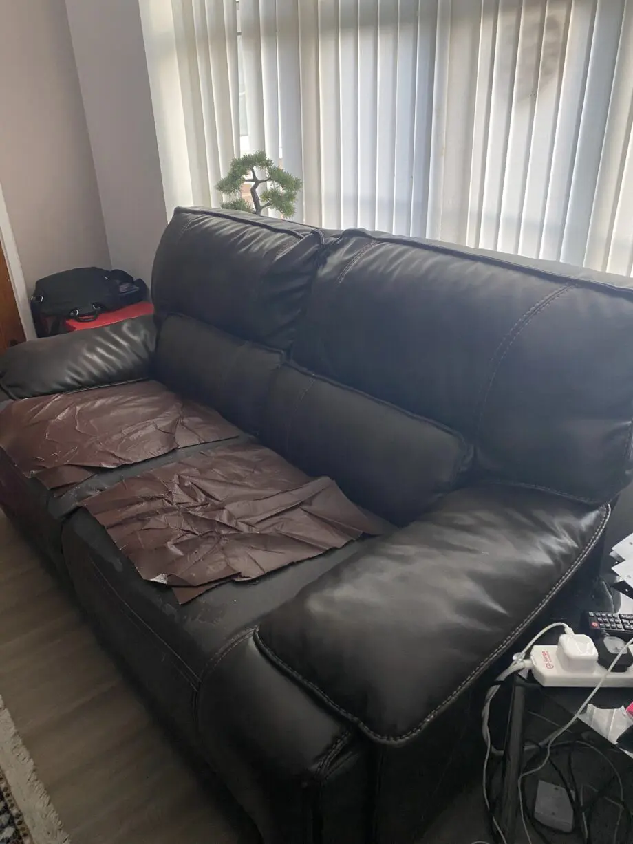 Brown 2 seater recliner (manual) sofa