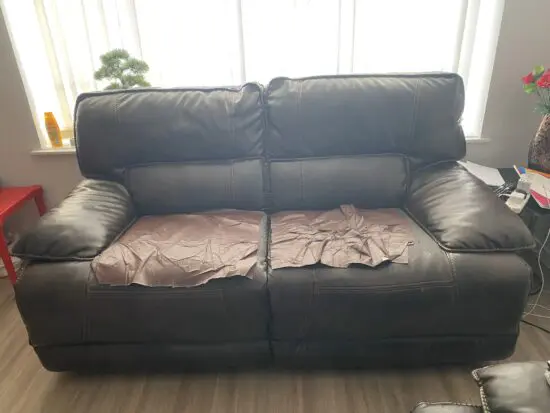 Brown 2 seater recliner (manual) sofa