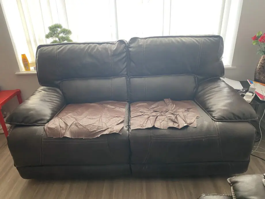 Brown 2 seater recliner (manual) sofa