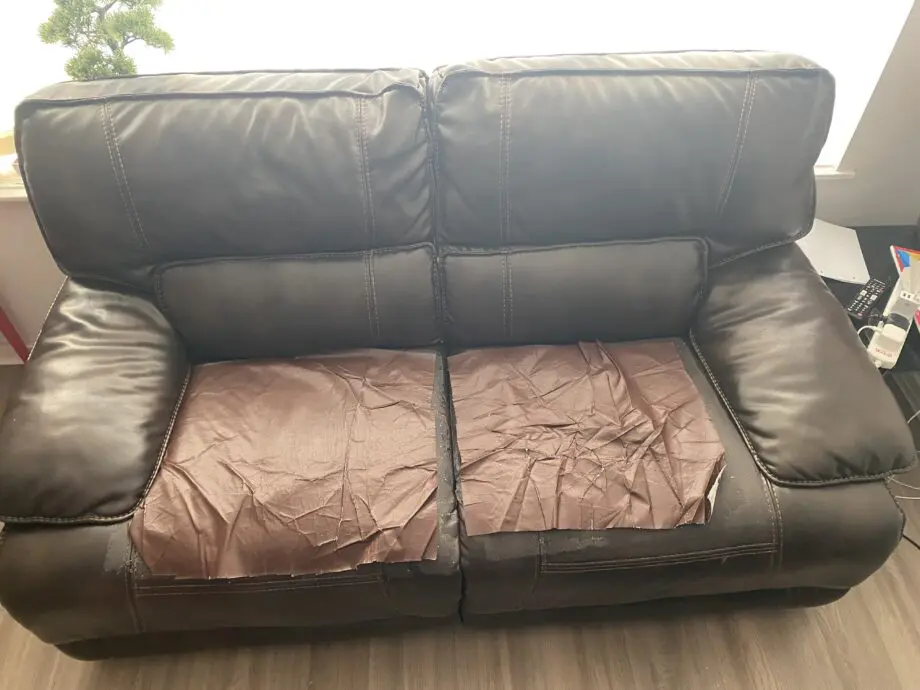Brown 2 seater recliner (manual) sofa