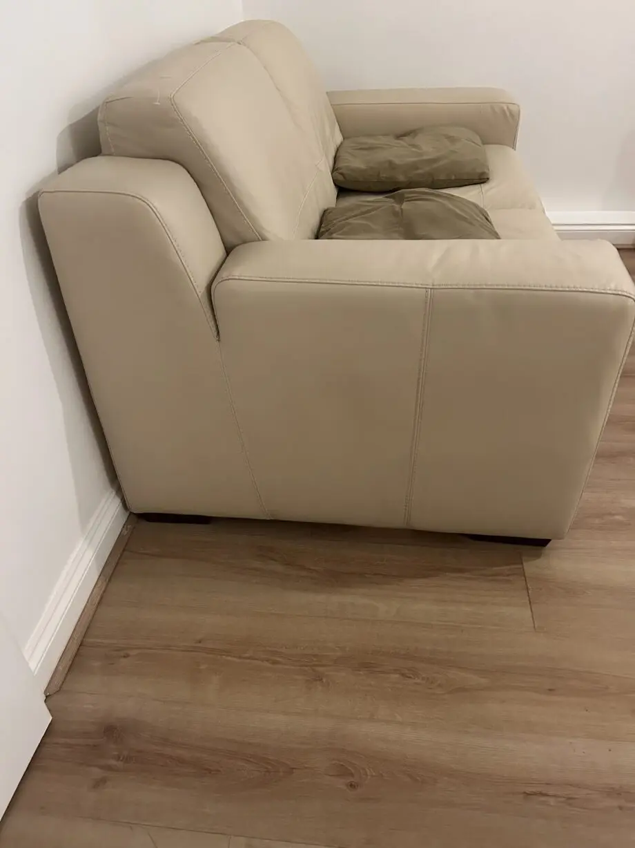 DFS Cream Leather Two Seater Sofa