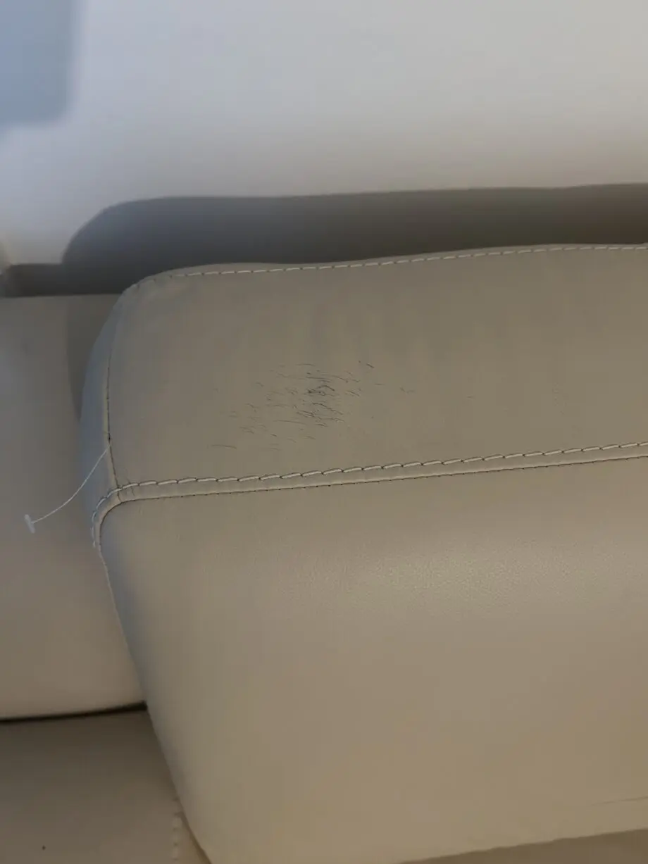DFS Cream Leather Two Seater Sofa