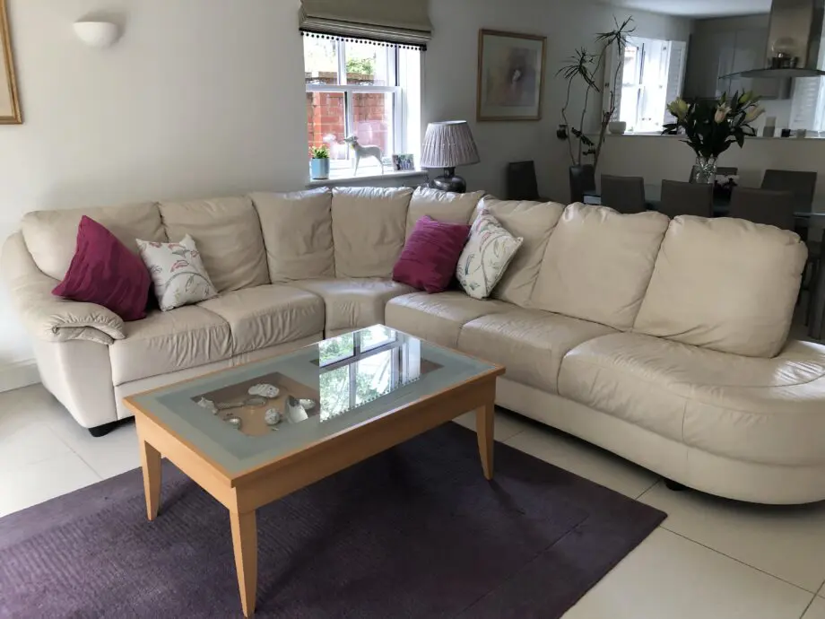 IKEA cream leather corner sofa splits in to three pieces