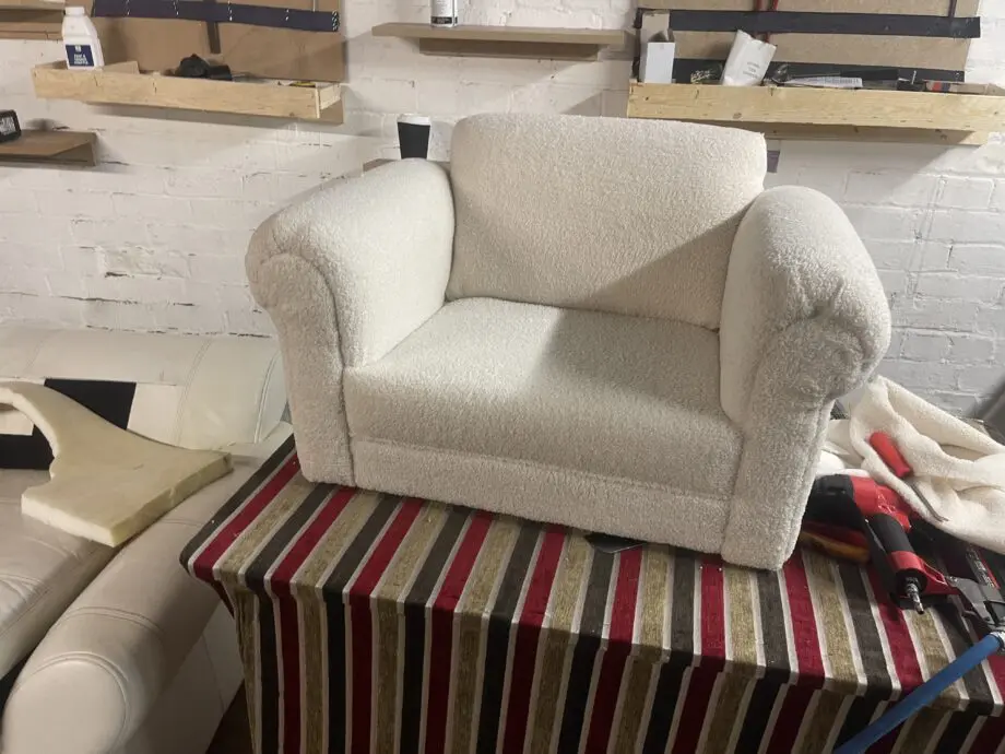 This is a costum build mini sofa for kids made in teddy fabric