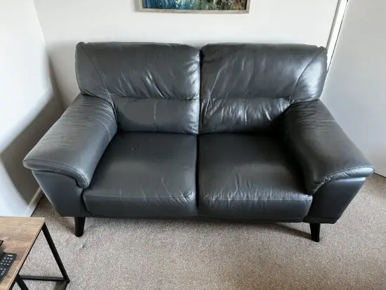 DFS full leather charcoal 2 seater sofa