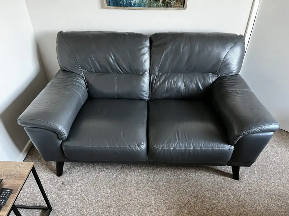 DFS full leather charcoal 2 seater sofa