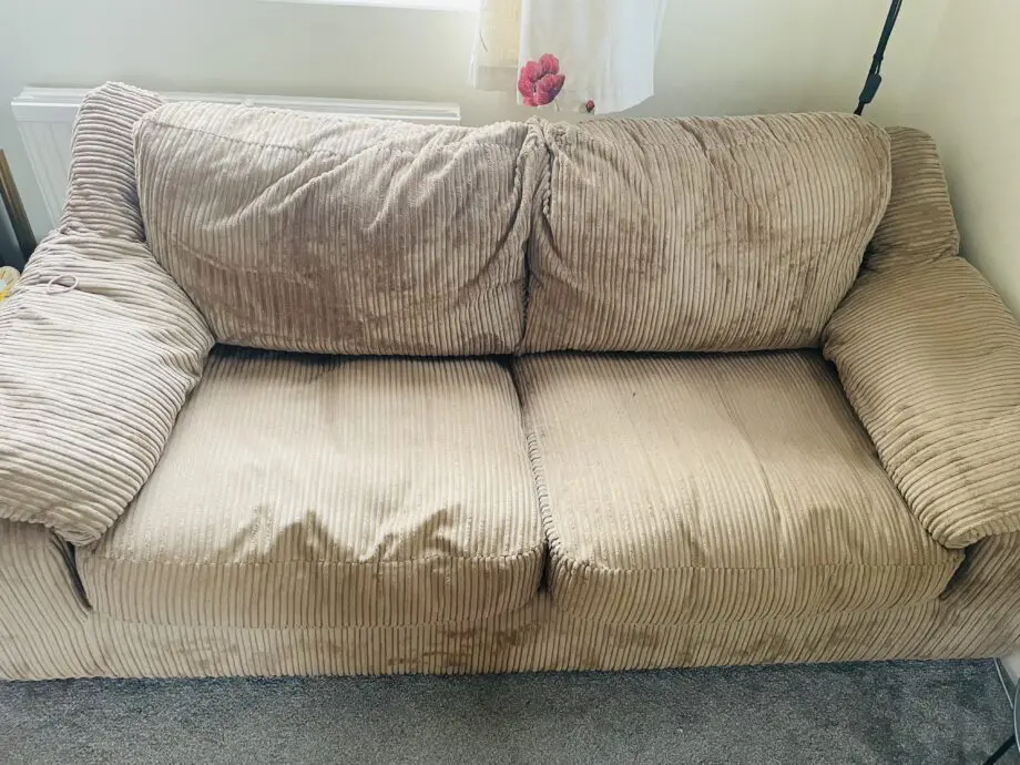Harvey’s brown sofa