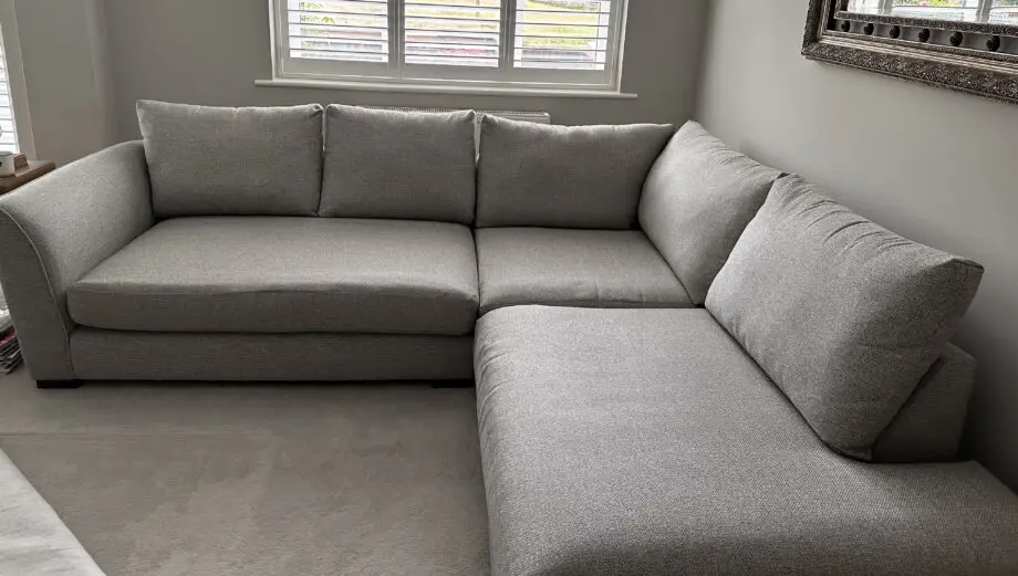 Corner sofa with an armchair and a footstool