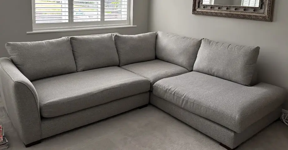 Corner sofa with an armchair and a footstool
