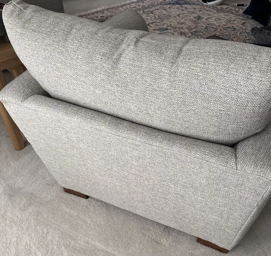 Corner sofa with an armchair and a footstool
