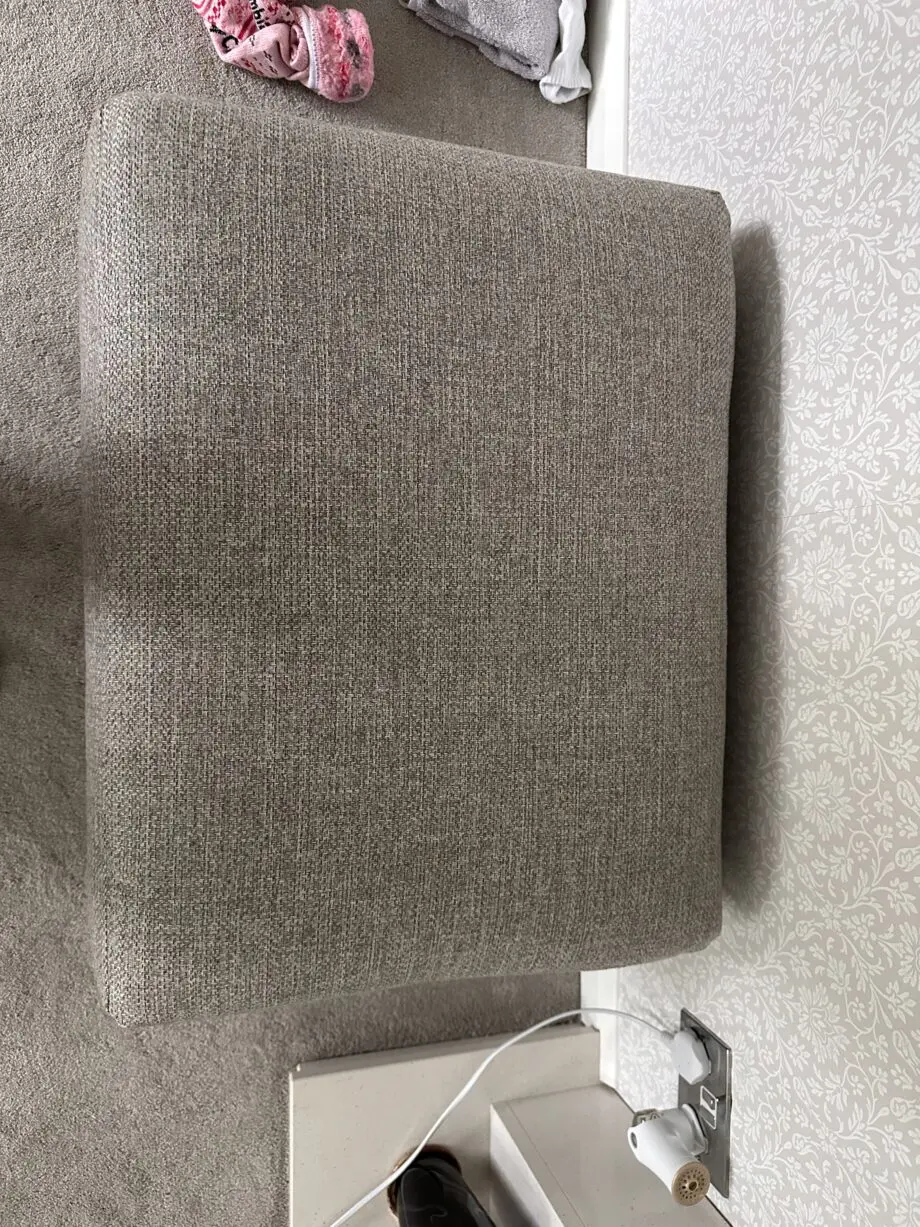 Corner sofa with an armchair and a footstool