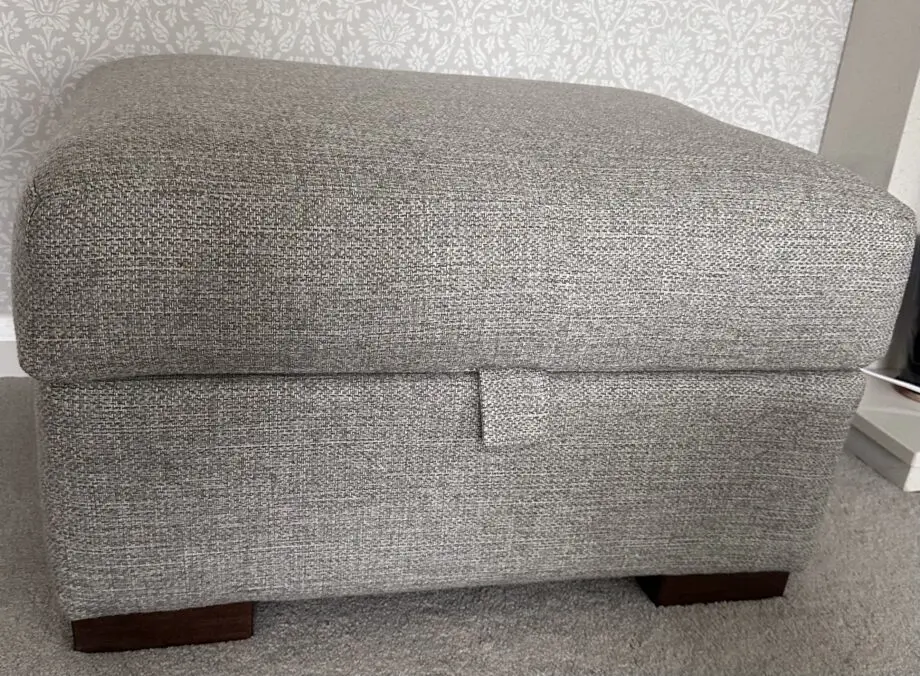 Corner sofa with an armchair and a footstool