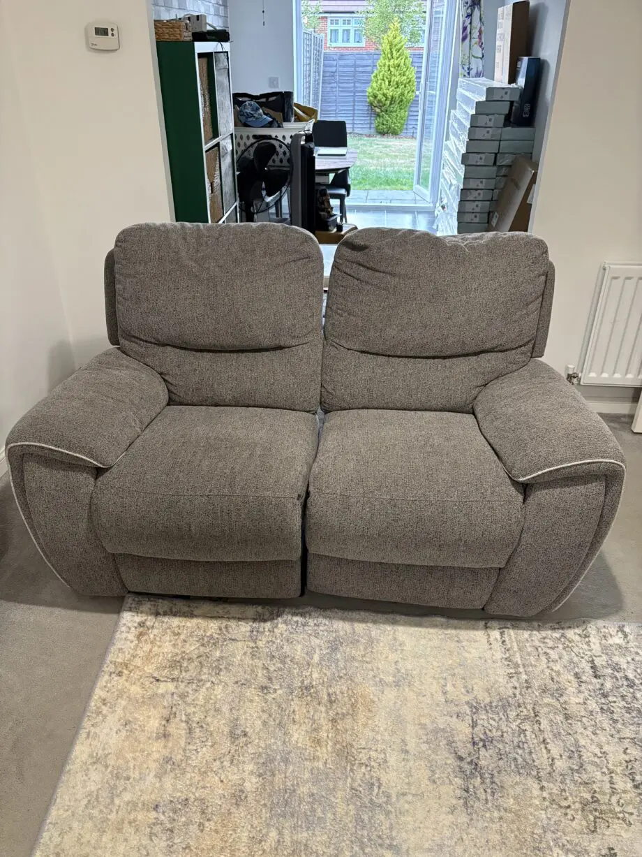 DFS Grey Recliner 2 seater sofa