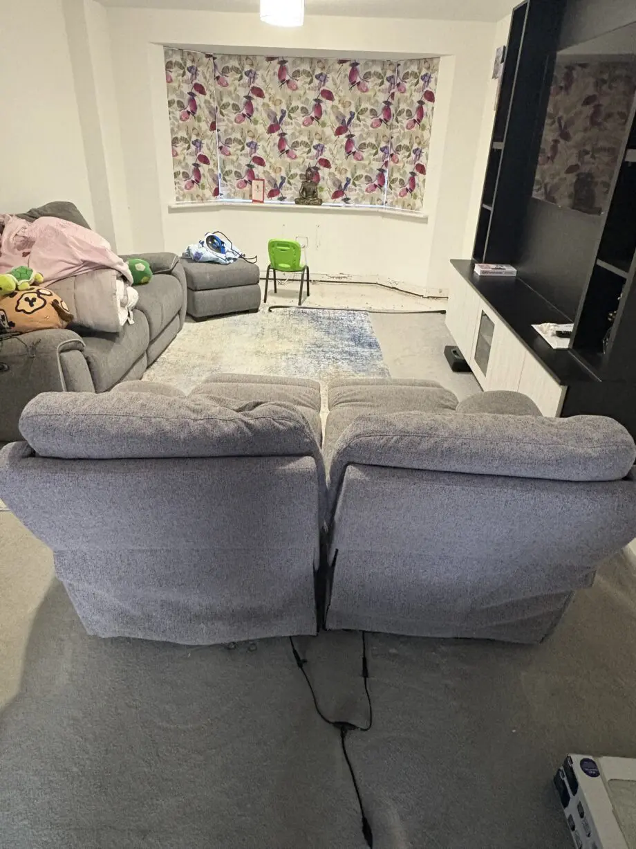 DFS Grey Recliner 2 seater sofa