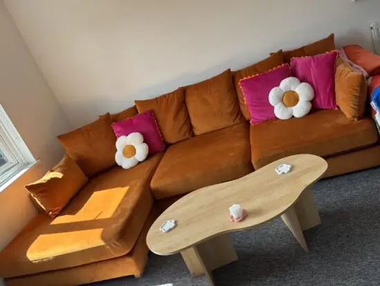 DFS Orange velvet corner sofa