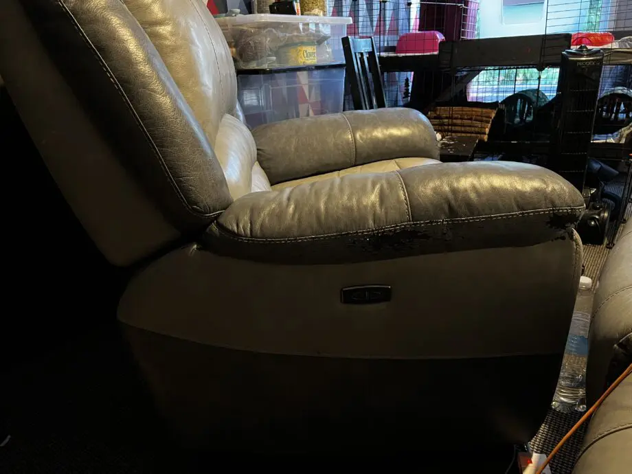 Grey electric reclining arm chair